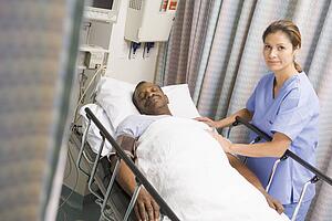 Nurse Caring For Patient