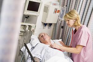 Doctor Checking Patient's Heartbeat