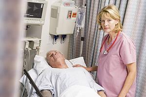 Doctor Caring For Patient