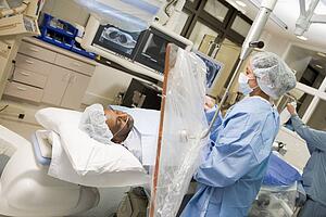 Surgeon Operating On Patient 