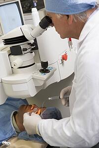 Doctor Checking Patient's Eyes