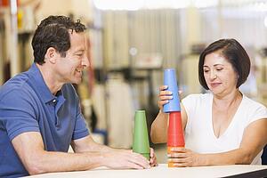 Physiotherapist With Patient In Rehabilitation