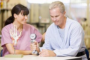 Nurse With Patient In Rehabilitation