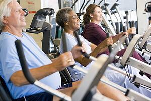 Patients Working Out In Gym