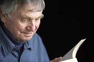 Senior man reading a book