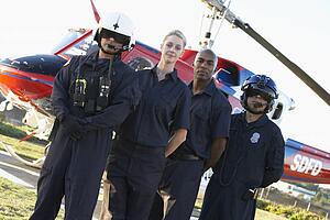 Portrait of paramedics standing in front of Medevac