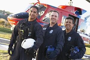 Portrait of paramedics standing in front of Medevac