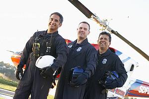 Portrait of paramedics standing in front of Medevac