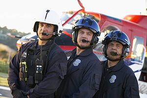 Portrait of paramedics standing in front of Medevac