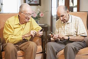Senior men text messaging