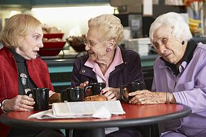 Senior women drinking tea together