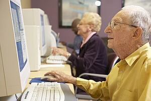 Senior man using computer