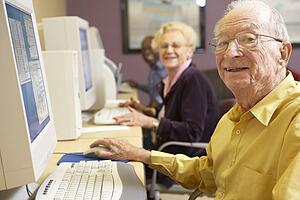 Senior man using computer