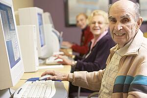 Senior man using computer
