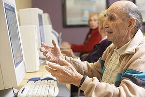 Senior man using computer