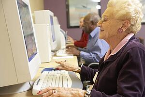 Senior woman using computer