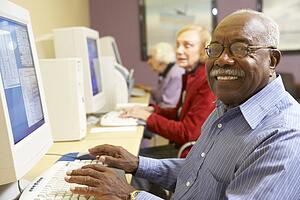 Senior man using computer