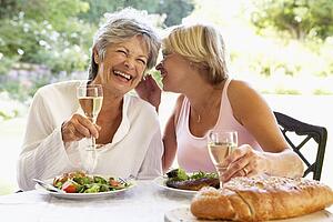 Friends Eating An Al Fresco Meal