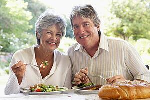 Couple Eating An Al Fresco Meal