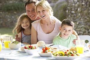 Family Eating An Al Fresco Meal