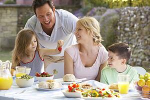 Family Eating An Al Fresco Meal