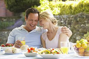 Couple Eating An Al Fresco Meal