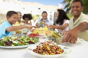 Family Eating An Al Fresco Meal