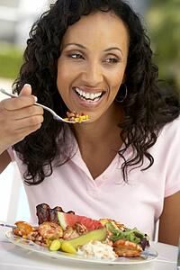 Middle Aged Woman Dining Al Fresco
