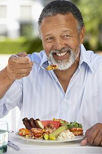 Middle Aged Man Dining Al Fresco