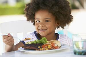 Young Girl Dining Al Fresco