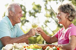 Couple Eating An Al Fresco Meal