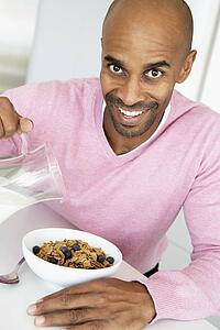 Middle Aged Man Eating Healthy Breakfast