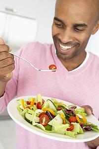 Middle Aged Man Eating Healthy Salad
