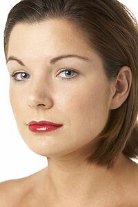 Portrait Of Young Woman With Red Lipstick