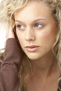 Portrait Of Young Woman Looking Thoughtful