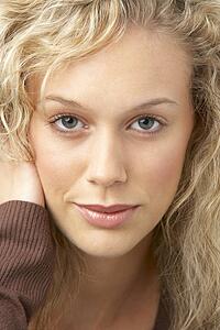 Portrait Of Young Woman Looking At Camera
