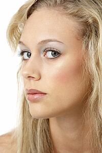 Portrait Of Young Woman Looking At Camera