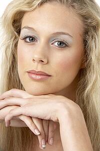 Portrait Of Young Woman Looking At Camera