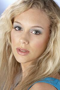 Portrait Of Young Woman Looking At Camera