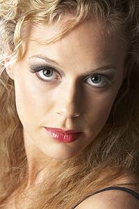 Portrait Of Young Woman Looking At Camera