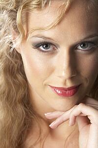 Portrait Of Young Woman Looking At Camera