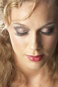 Close-Up Of Young Woman With Closed Eyes