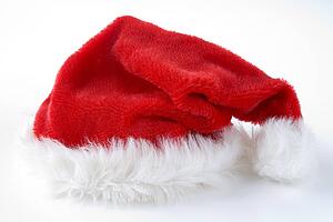 Red Santa Hat Against White Studio Background