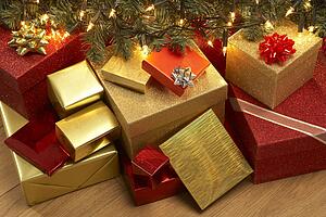 Group Of Christmas Presents Under Tree