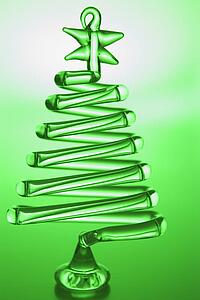 Tree Shaped Christmas Decoration Against Green Background