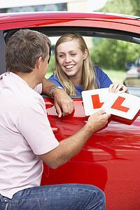 Teenage Girl Receiving Her Learner Plates
