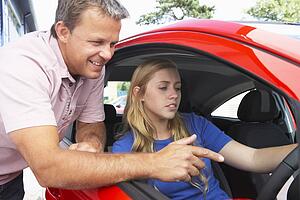 Teenage Girl Learning How To Drive