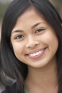 Portrait Of Teenage Girl Smiling
