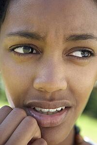 Portrait Of Teenage Girl Looking Worried