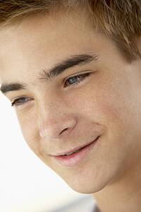 Portrait Of Teenage Boy Smiling